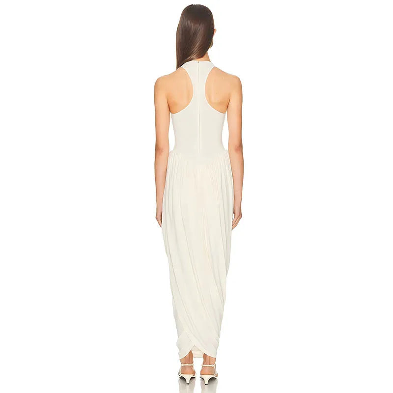 Woman wearing a white sleeveless dress on a white background