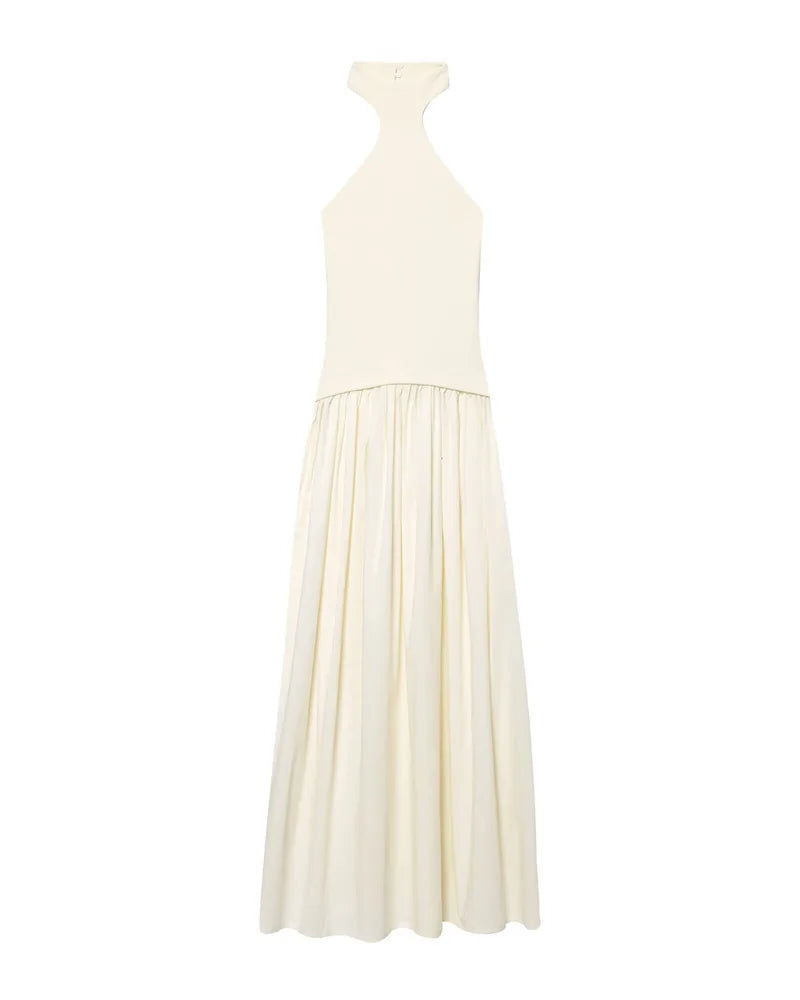 White halter neck dress with a flowing skirt on a white background