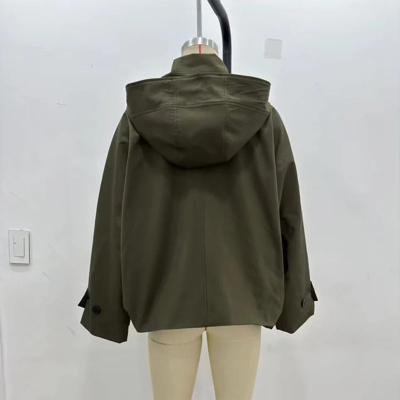 Green hooded jacket on a mannequin against a white background