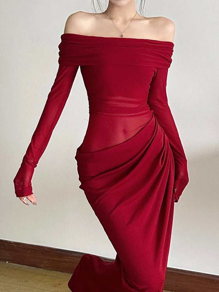 Red off-shoulder dress with long sleeves on a plain background
