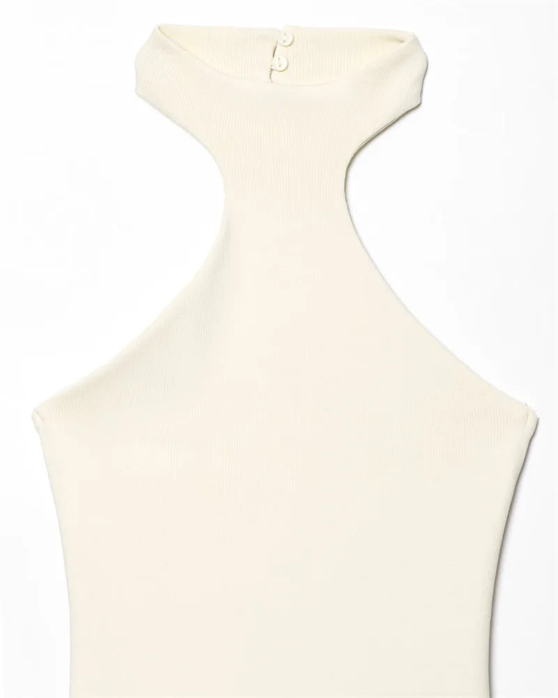Cream-colored halter top on a white background